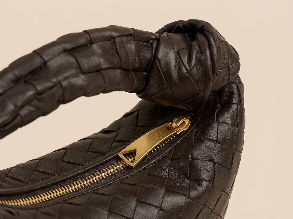 Bottega Veneta Jodie Mini — Brown, gold zipper and knotted handle close-up