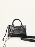 תיק נשים Balenciaga City Mini שחור – חזית על רקע שנהב