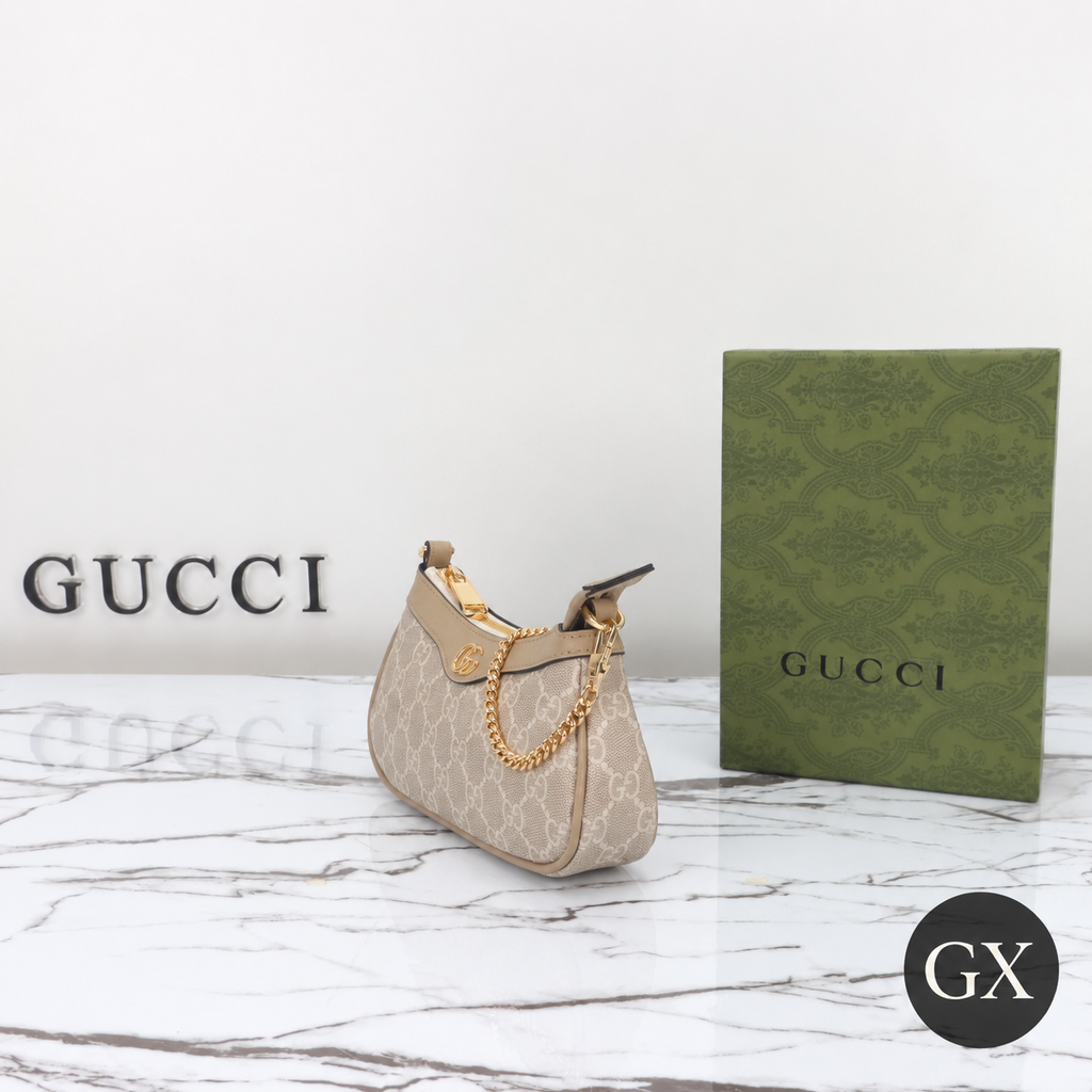 Gucci Ophidia mini bag beige and white GG Supreme – side view with GX logo