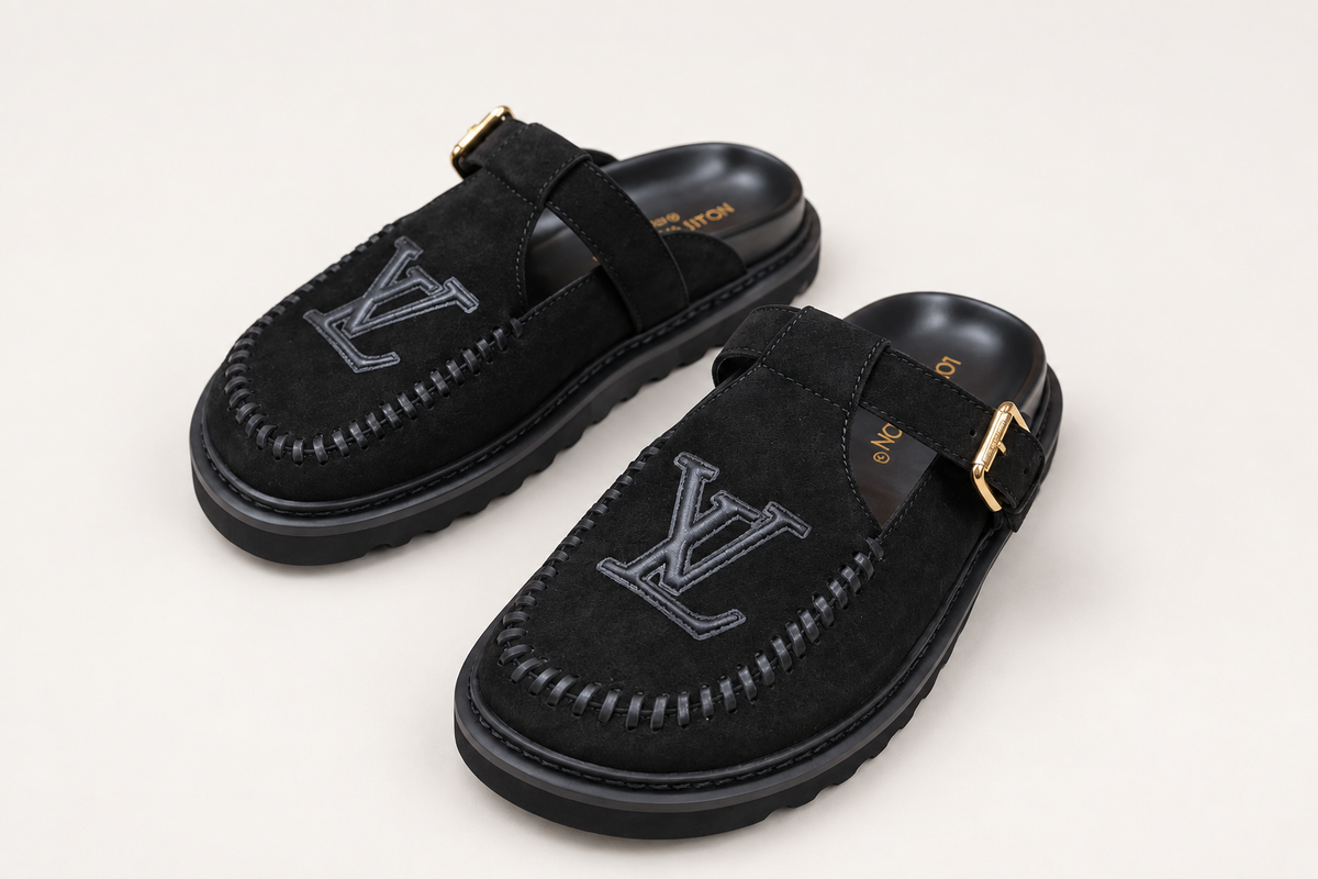 Louis Vuitton Suede Buckle Mule Black clean background angled view
