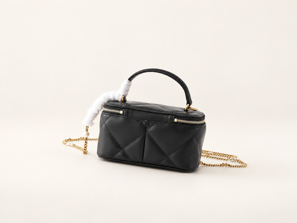 תיק Tory Burch Kira שחור – גב על רקע סטודיו